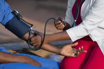 Humanitarian Aid Doctor Providing Care to a African Patient