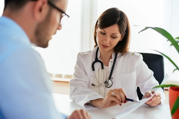 Doctor Discussing Results with Her Patient in the Office