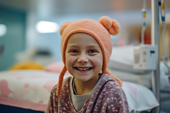 Hospitalized Children with Cancer Smiling in Hospital Beds