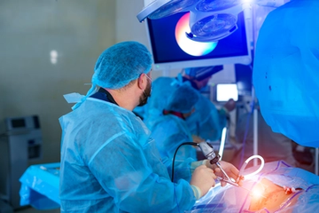 Surgeons Performing Surgery on a Patient in an Operating Room