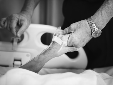 Husband Holding His Wife's Hand in the Hospital: A Heartfelt Moment