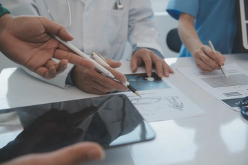 Professional Doctors in a Modern Hospital Conference Meeting