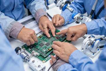 team reviewing a medical-device prototype